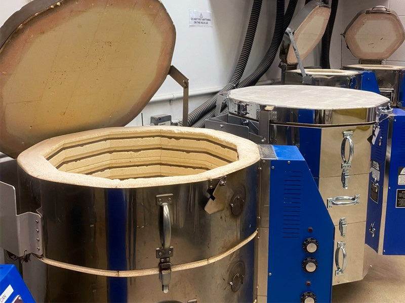 Bisque firing our clay figurines in a ceramic kiln