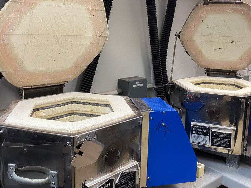 Final firing of our clay figurines in a ceramic kiln