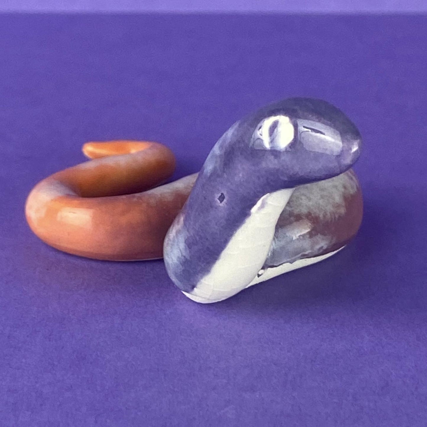 Sisra - Handmade Dawn Snake Figurine Politely Declining - Face