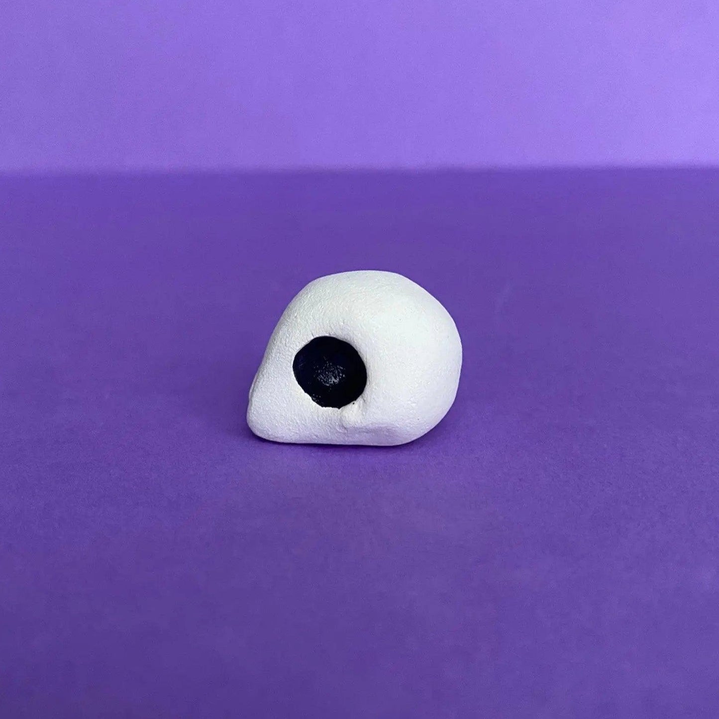 Elxa - Handmade Tiny Skull Figurine Politely Declining - Profile Left