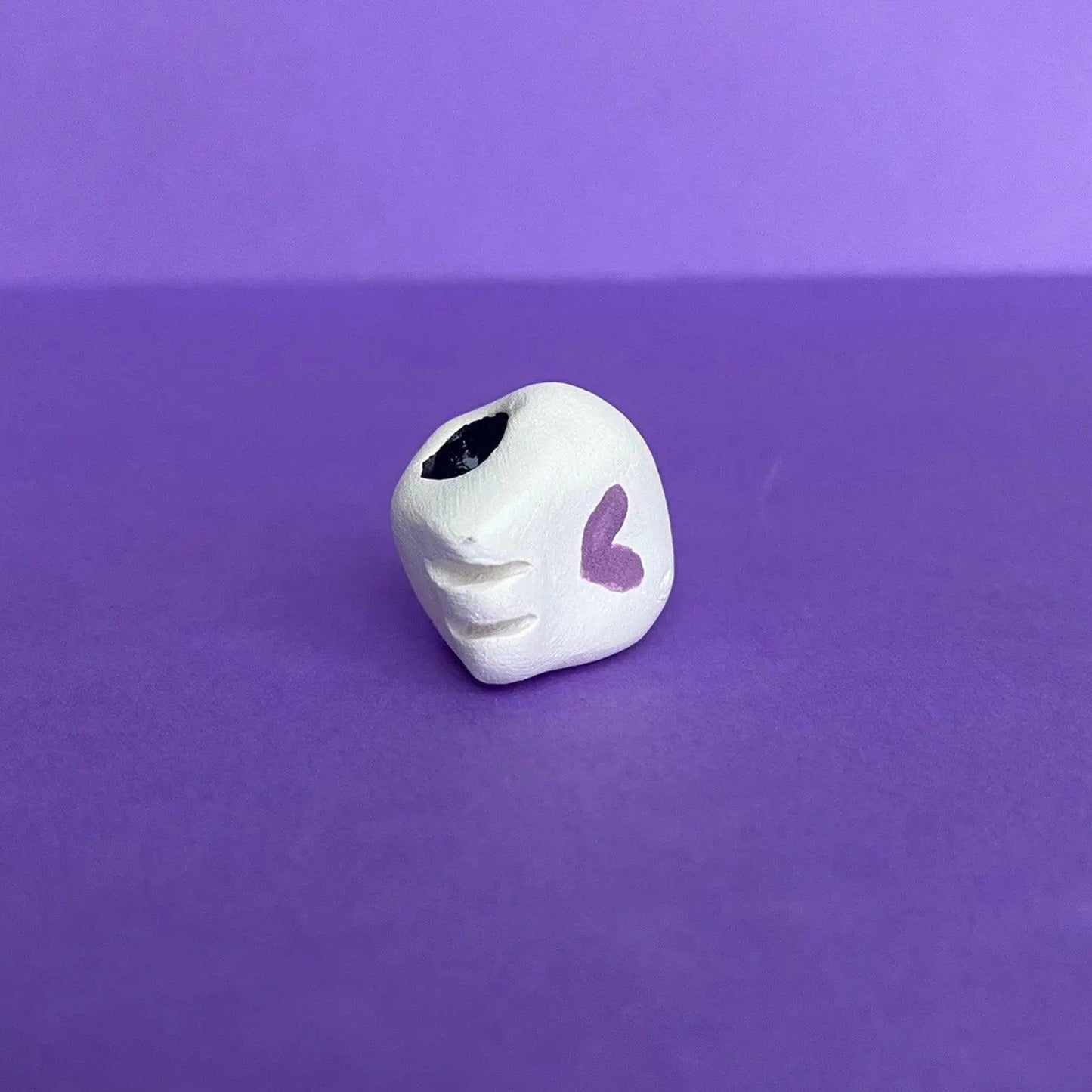 Elxa - Handmade Tiny Skull Figurine Politely Declining - Sideway Bottom