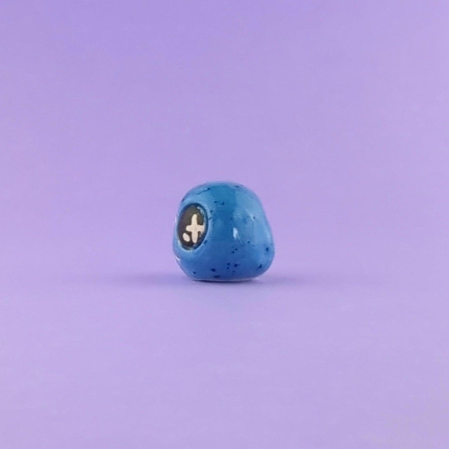 Kymi - Handmande Tiny Blue Figurine Politely Declining - Side Left