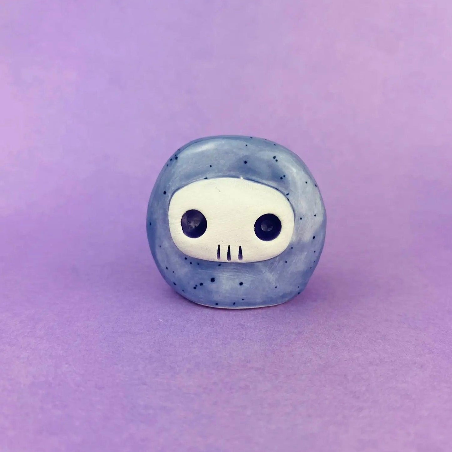 Skelltos - Handmade Purple Skull Figurine Politely Declining