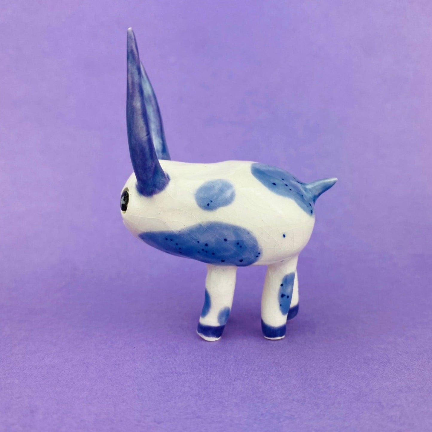 Cosmic Deer - Handmade Purple Cow Figurine Politely Declining