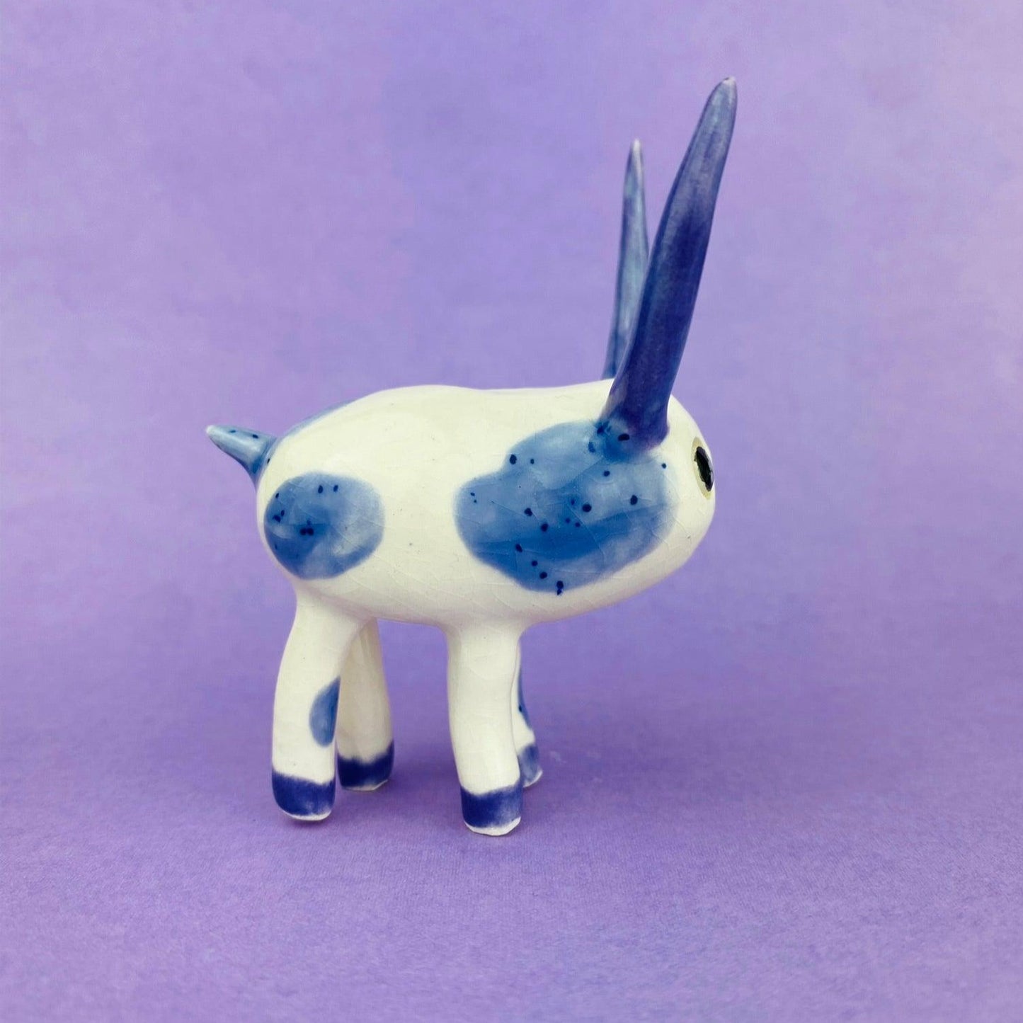 Cosmic Deer - Handmade Purple Cow Figurine Politely Declining