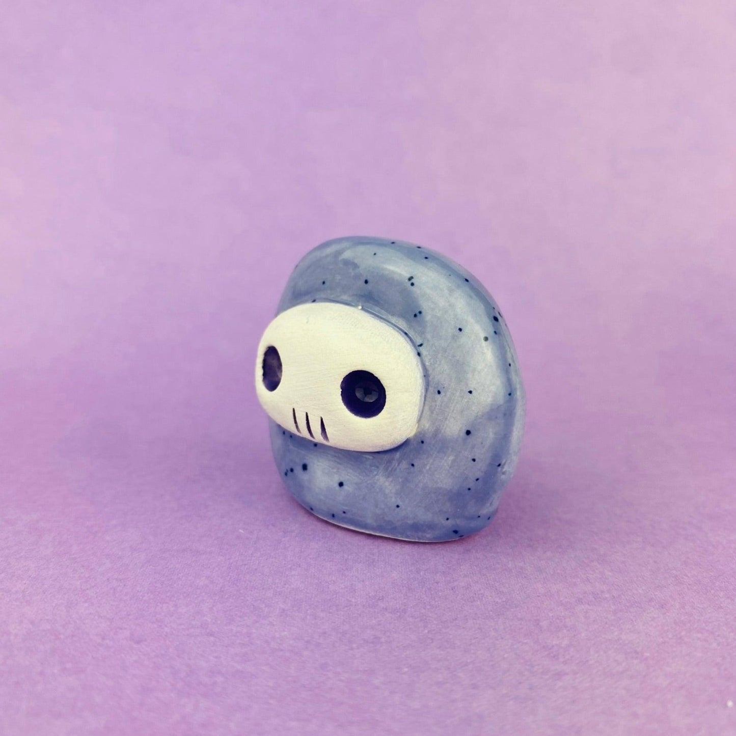 Skelltos - Handmade Purple Skull Figurine Politely Declining