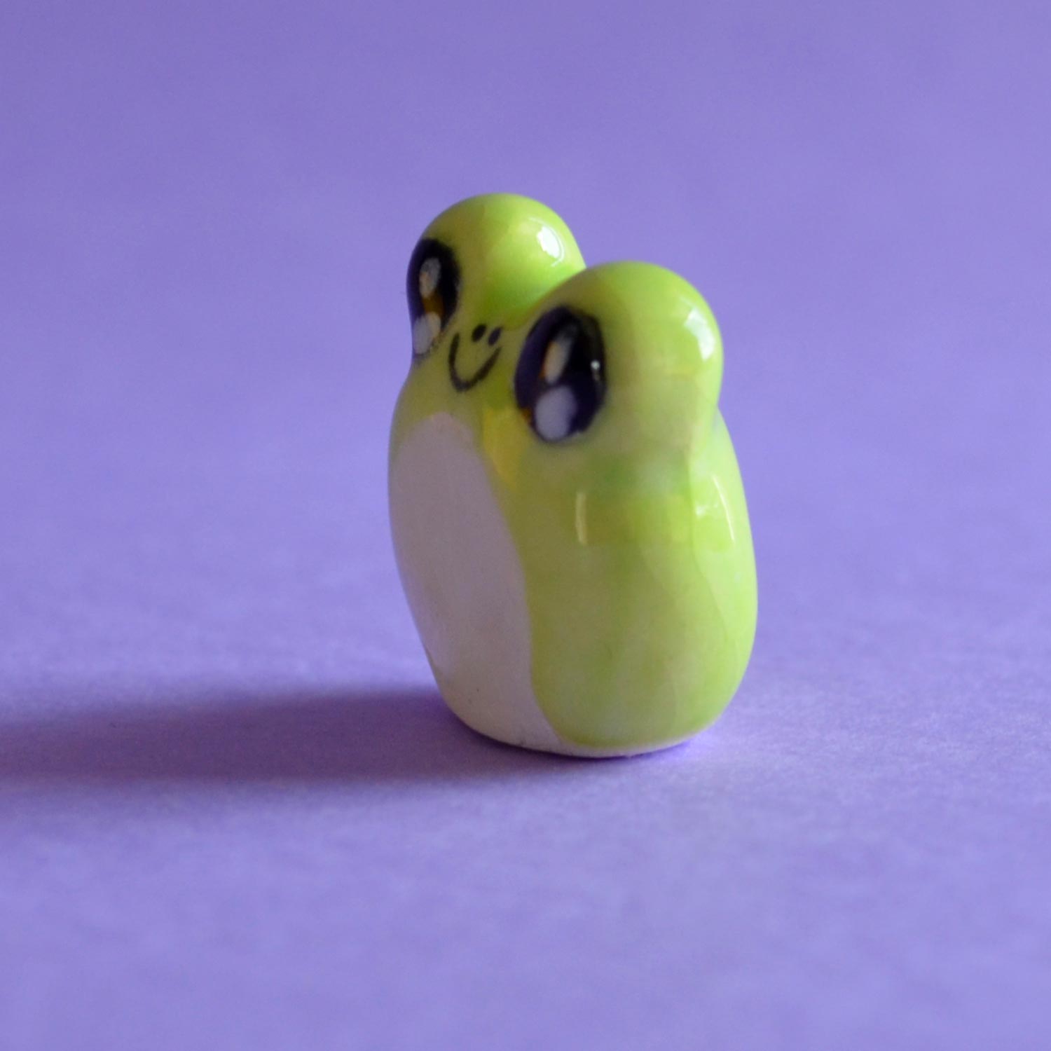 Junie - Handmade Tiny Frog Figurine Politely Declining - Side Left