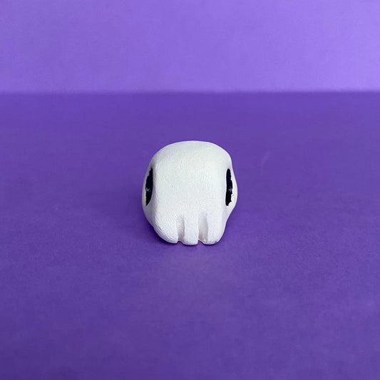 Elxa - Handmade Tiny Skull Figurine Politely Declining - Front