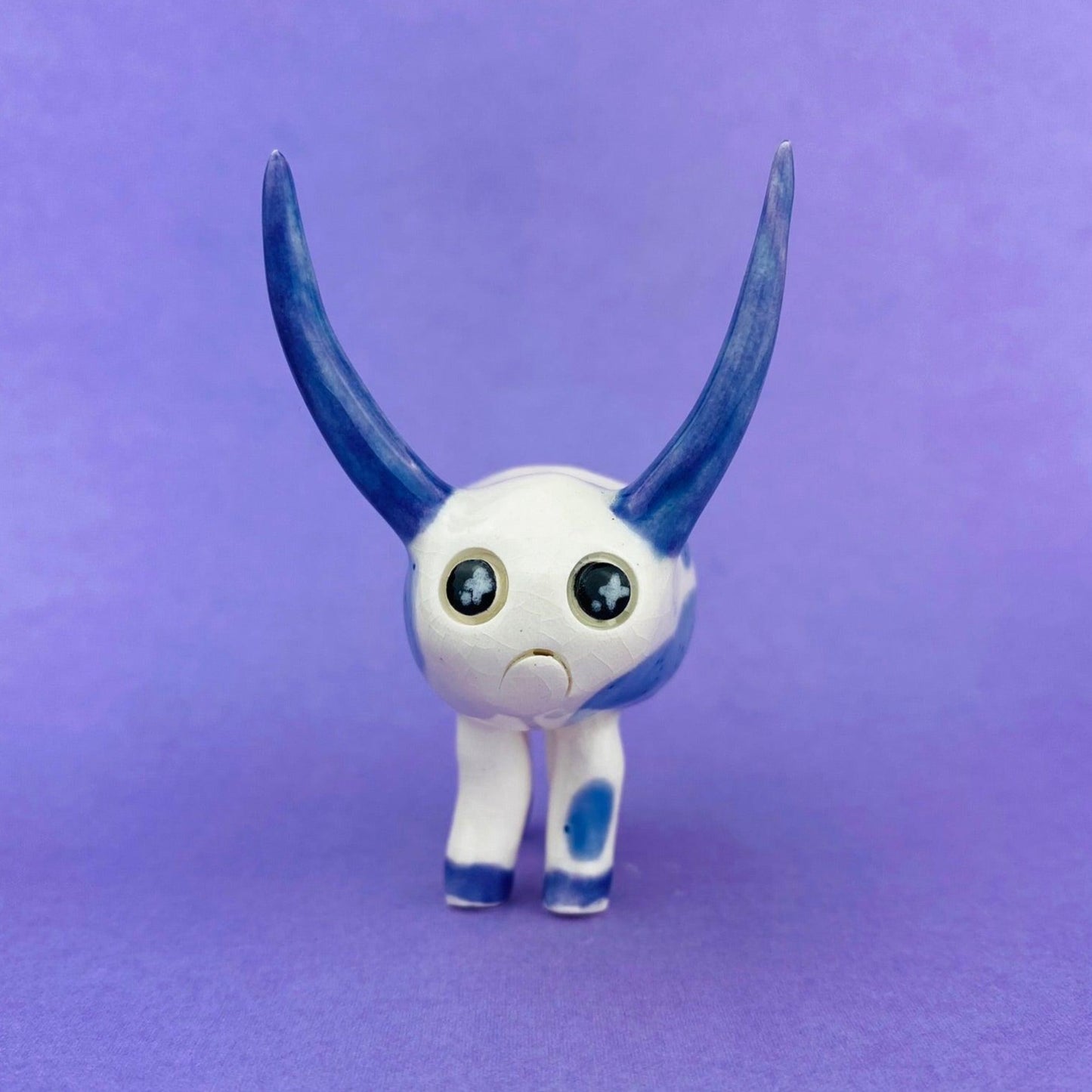 Cosmic Deer - Handmade Purple Cow Figurine Politely Declining